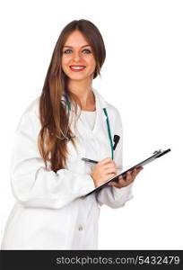 Beautiful young doctor writing in a folder isolated on white