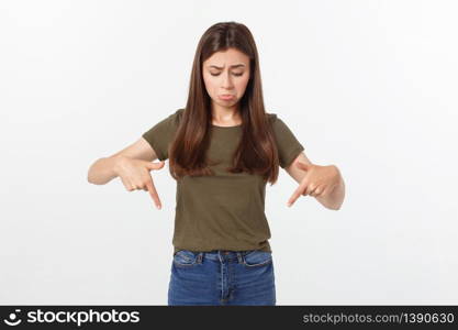 Beautiful young elegant woman over isolated background pointing hand and fingers with sad expression. Beautiful young elegant woman over isolated background pointing hand and fingers with sad expression.