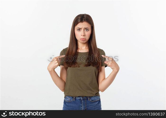Beautiful young elegant woman over isolated background pointing hand and fingers with sad expression. Beautiful young elegant woman over isolated background pointing hand and fingers with sad expression.