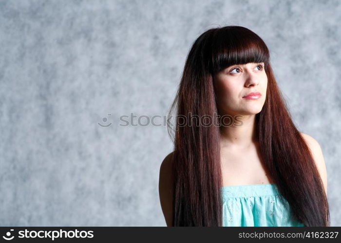 beautiful young female face with long beauty hair