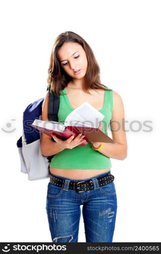 Beautiful young female student reading a book, isolated on white