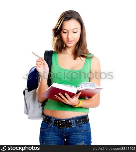 Beautiful young female student studying, isolated on white