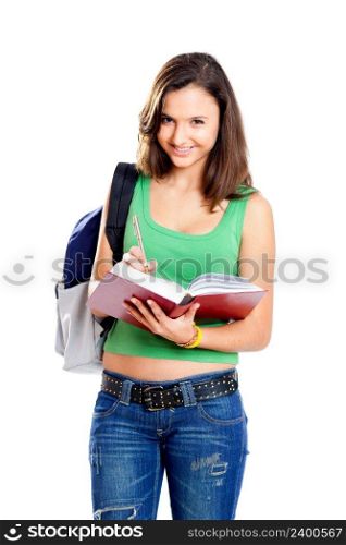 Beautiful young female student studying, isolated on white