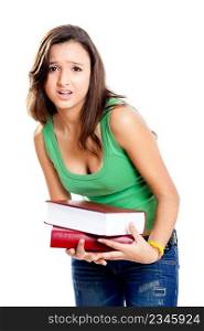Beautiful young female student tired of carying books, isolated on white