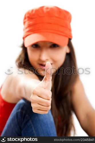 Beautiful young female student with thumbs up