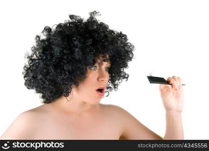 Beautiful young frizzy woman with hair at comb isolated over white background. Lost hairs concept.