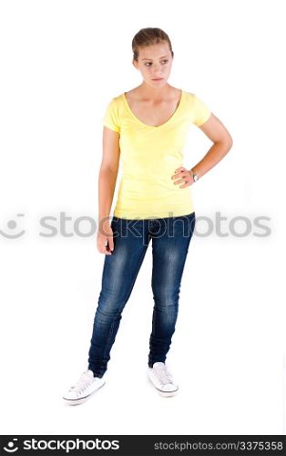 Beautiful young girl in stylish jeans isolated on white background.