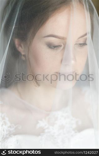 Beautiful young girl is in a wedding decoration