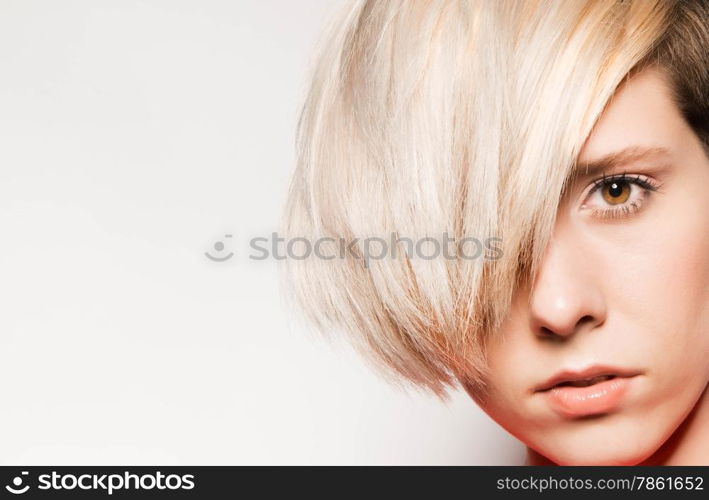 Beautiful young girl on a light background