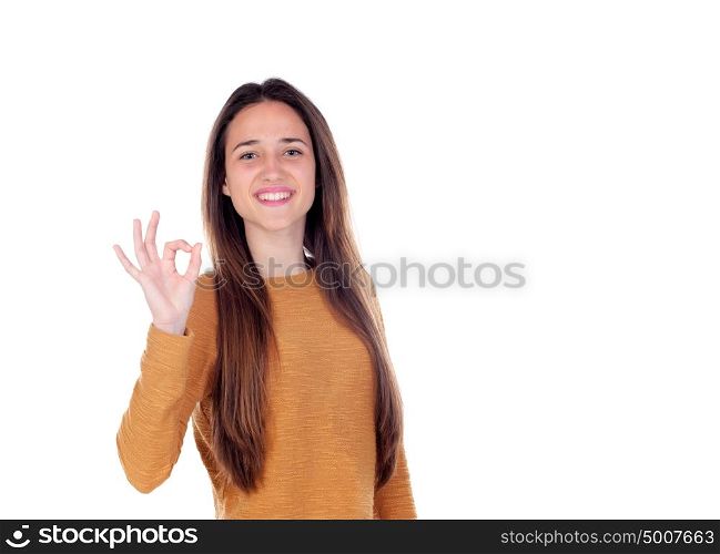 Beautiful young girl showing ok sign with her hand isolated on a white background