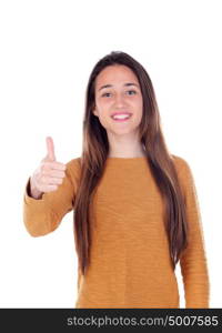 Beautiful young girl showing ok sign with his thumbs isolated on a white background