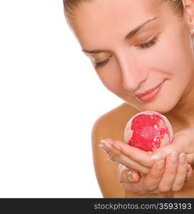 Beautiful young girl with a bath bomb