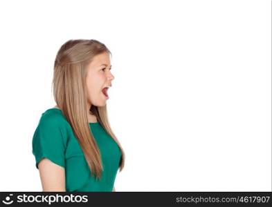 Beautiful young girl with green t-shirt screaming out loud isolated on white background