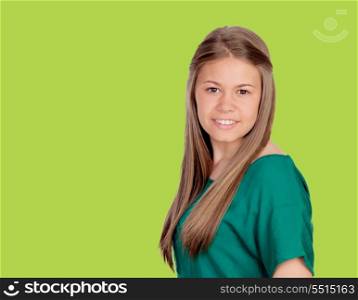 Beautiful young girl with t-shirt on green background