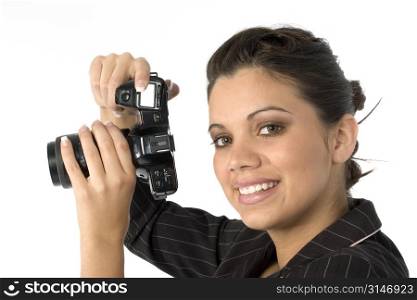 Beautiful young Hispanic woman with film camera.