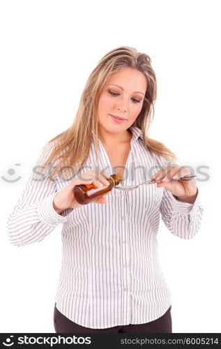 Beautiful young ill woman drinking syrup