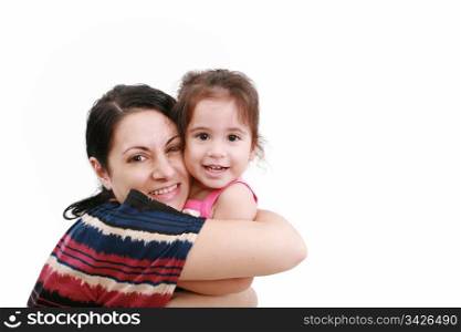 beautiful young mother and her two year old daughter looking at camera