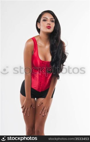 Beautiful young multiracial woman in a red bustier