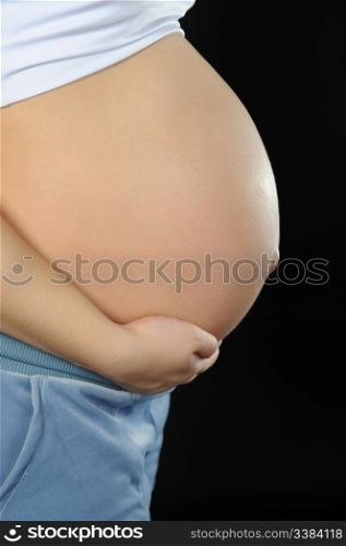 beautiful young pregnant woman. Isolated on white background