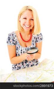 Beautiful young smiling girl with magnifying glass and map over white background