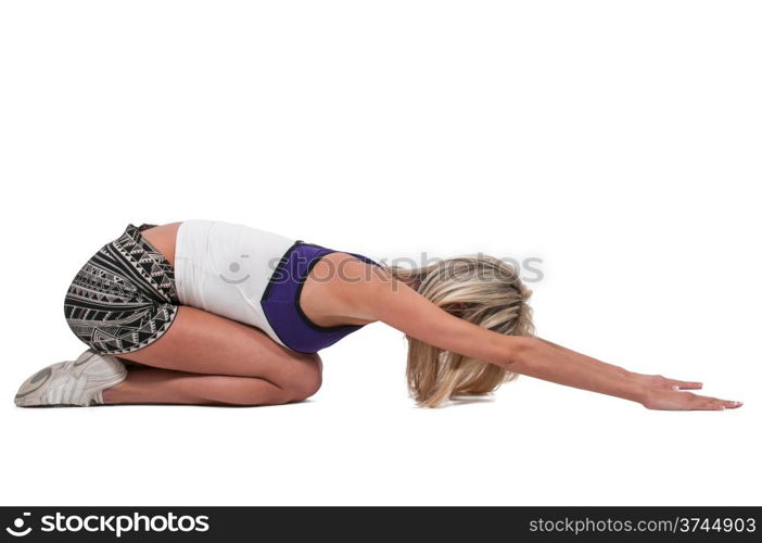 Beautiful young tired woman stretching her arms and legs