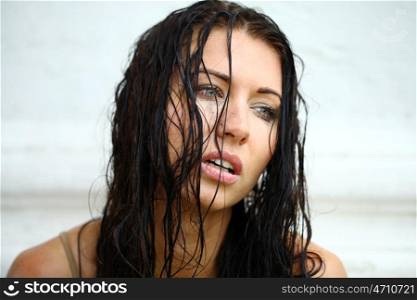 Beautiful young woman after the rain