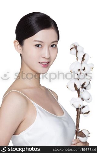 Beautiful young woman and cotton