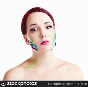 Beautiful young woman and painted face, white background