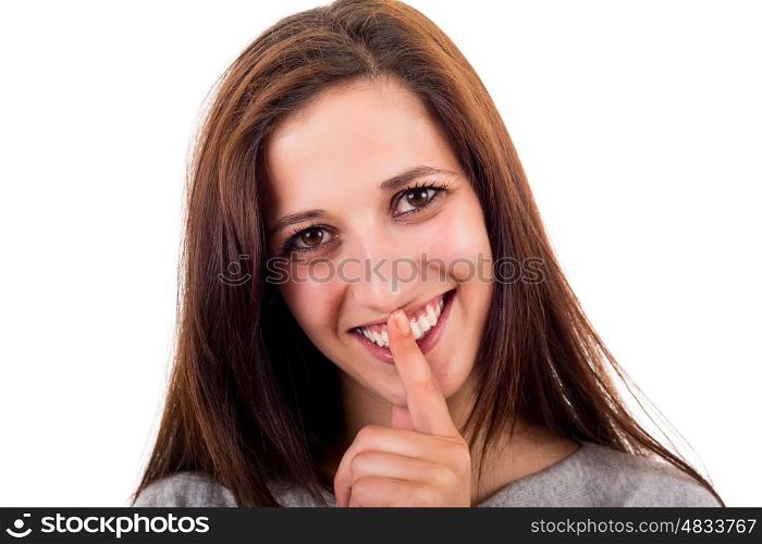 Beautiful young woman asking for silence isolated