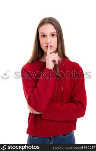 Beautiful young woman asking for silence isolated