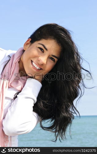 Beautiful young woman at beach