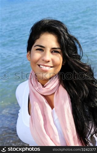 Beautiful young woman at beach