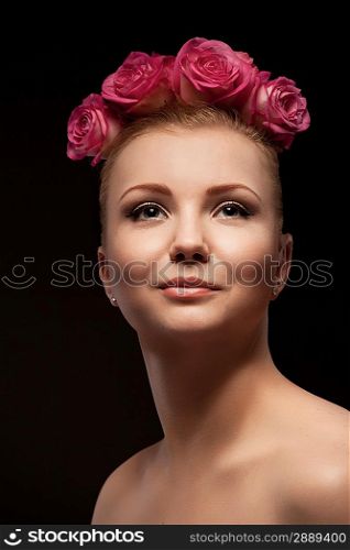 beautiful young woman beauty shot at dark background