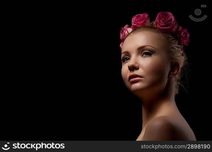 beautiful young woman beauty shot at dark background