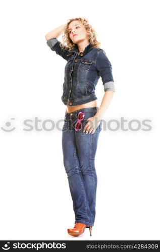 Beautiful young woman blonde 20s standing full body in jeans wear isolated on white background Caucasian girl