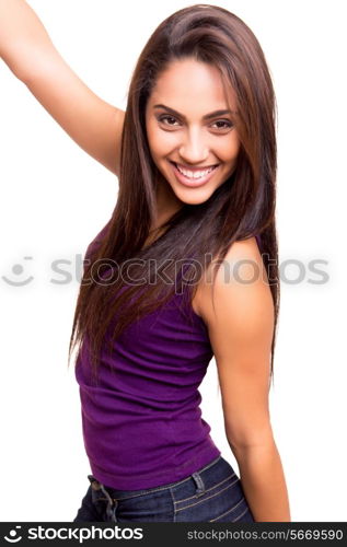 Beautiful young woman celebrating over white background