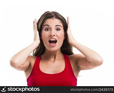 Beautiful young woman covering her ears with hands, isolated over a white background