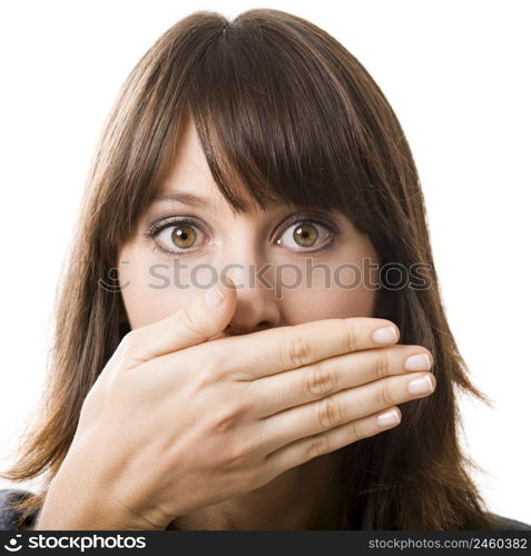 Beautiful young woman covering the face with her hand, isolated on a white background