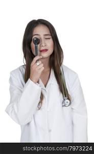 Beautiful young woman doctor holding an otoscope