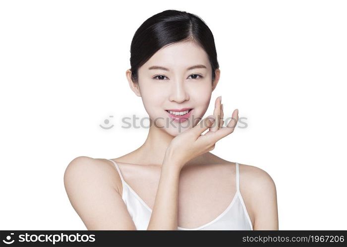 Beautiful young woman dragging her chin