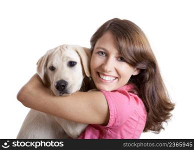 Beautiful young woman embracing a cute dog