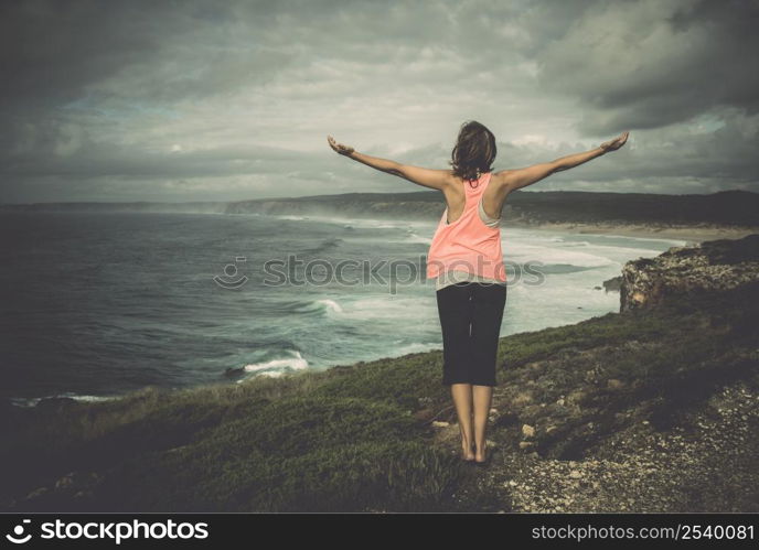 Beautiful young woman enjoying the freedom