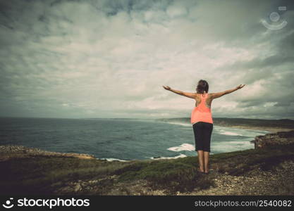 Beautiful young woman enjoying the freedom