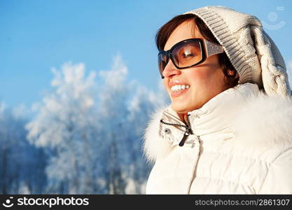 Beautiful young woman enjoying winter day