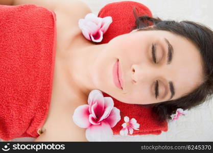 beautiful young woman getting spa treatment