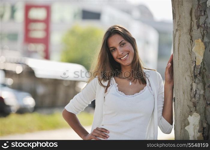 beautiful young woman have fun and relax at city street on beautiful sunny day