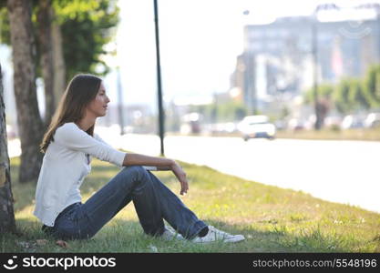 beautiful young woman have fun and relax at city street on beautiful sunny day