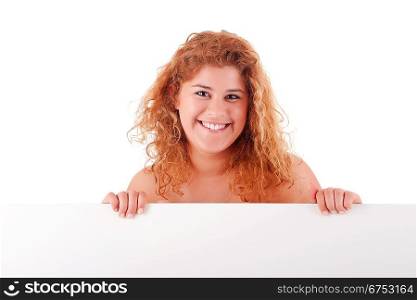 Beautiful young woman holding a blank white board