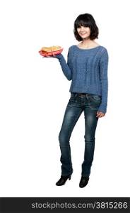 Beautiful young woman holding a cheeseburger and fries