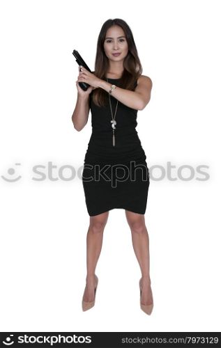 Beautiful young woman holding a loaded handgun